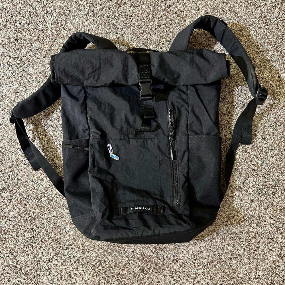 Timbuk2 classic foldable pack with Red Bull pins